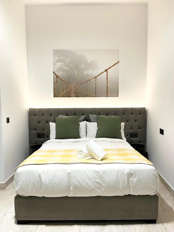 Posteľ alebo postele v izbe v ubytovaní Tennessee Urban Suites