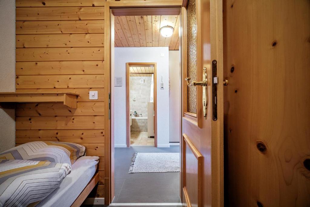 Postel nebo postele na pokoji v ubytování Zum Rota Hus 07B