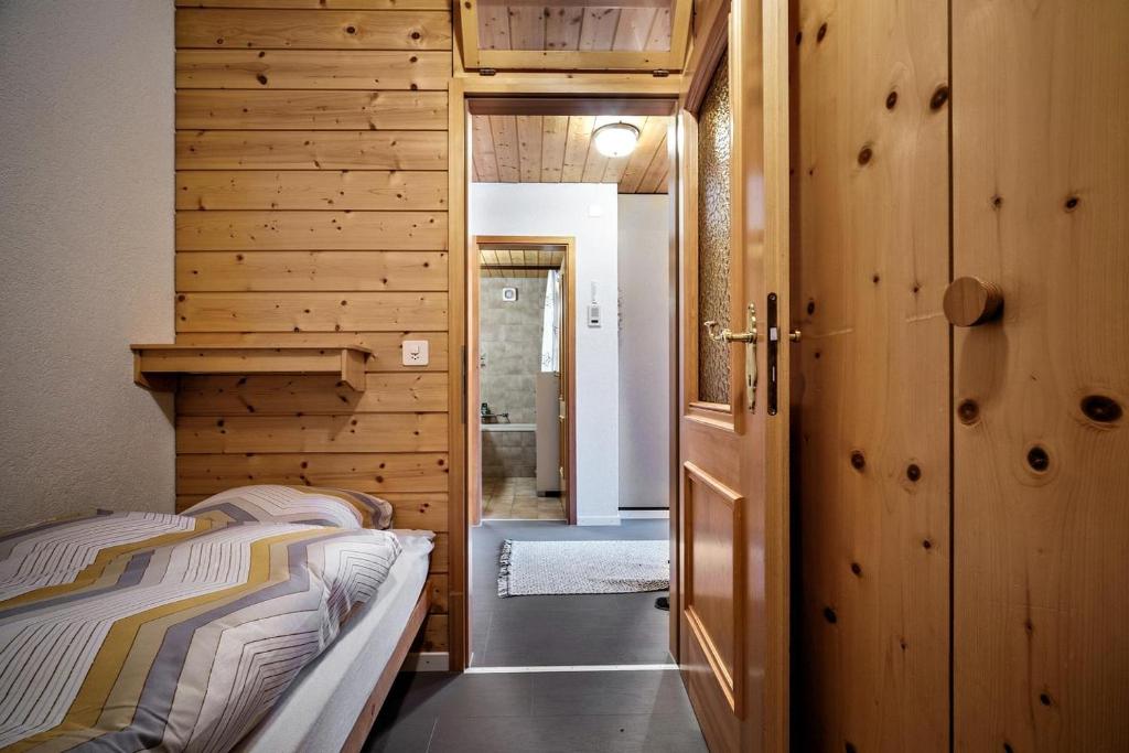 Postel nebo postele na pokoji v ubytování Zum Rota Hus 07B