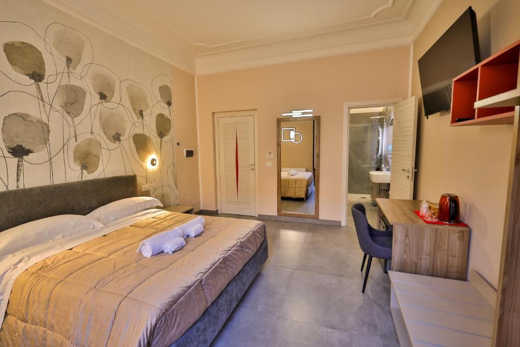 Postel nebo postele na pokoji v ubytování Brettia Guest Rooms