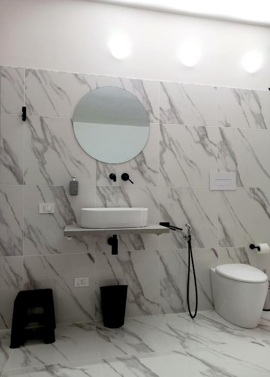 Koupelna v ubytování Jacuzzi Suite King