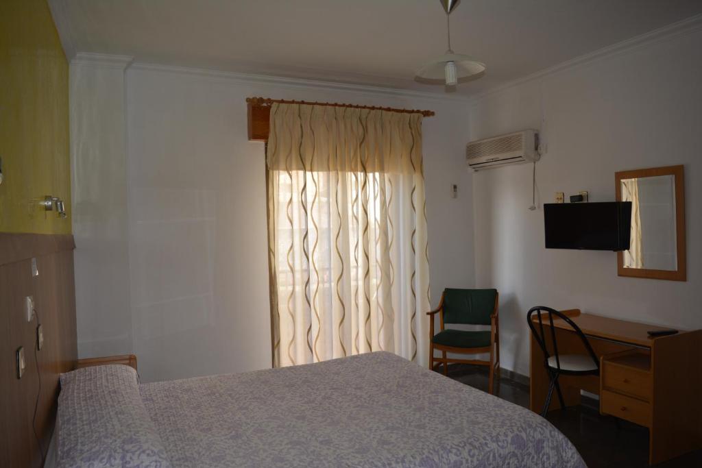 Postel nebo postele na pokoji v ubytování Hostal Manolete