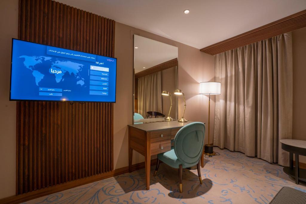 TV a/nebo společenská místnost v ubytování Najm aris hotel