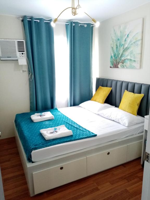Postel nebo postele na pokoji v ubytování Ann's Condo "2bedroom"