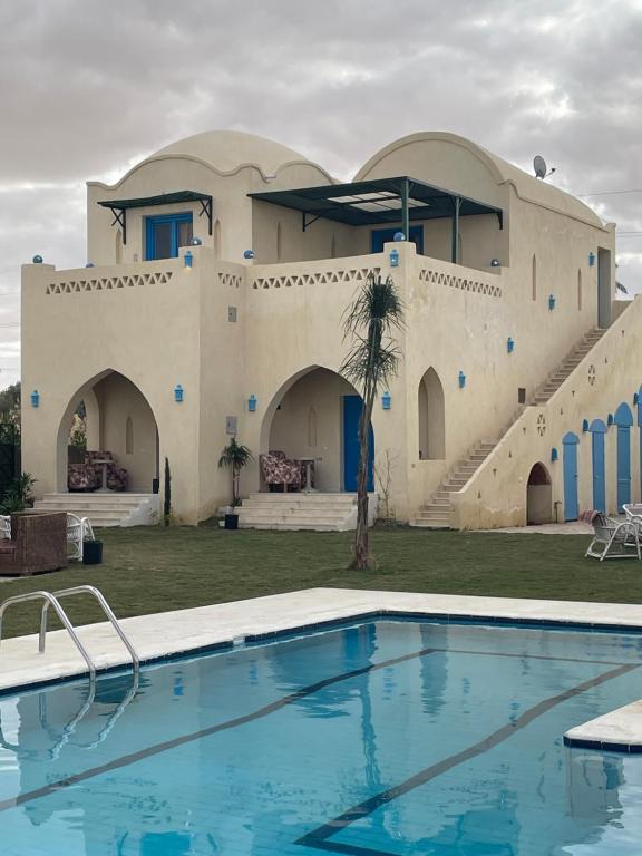 Bazén v ubytování Lake House by Tunisia Green Resort nebo v jeho okolí