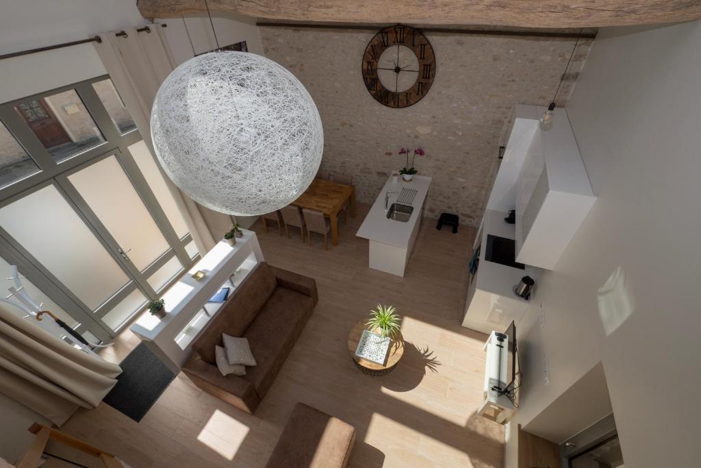 an overhead view of a living room with a ceiling at Gite Oliveira&#39;s in Ury