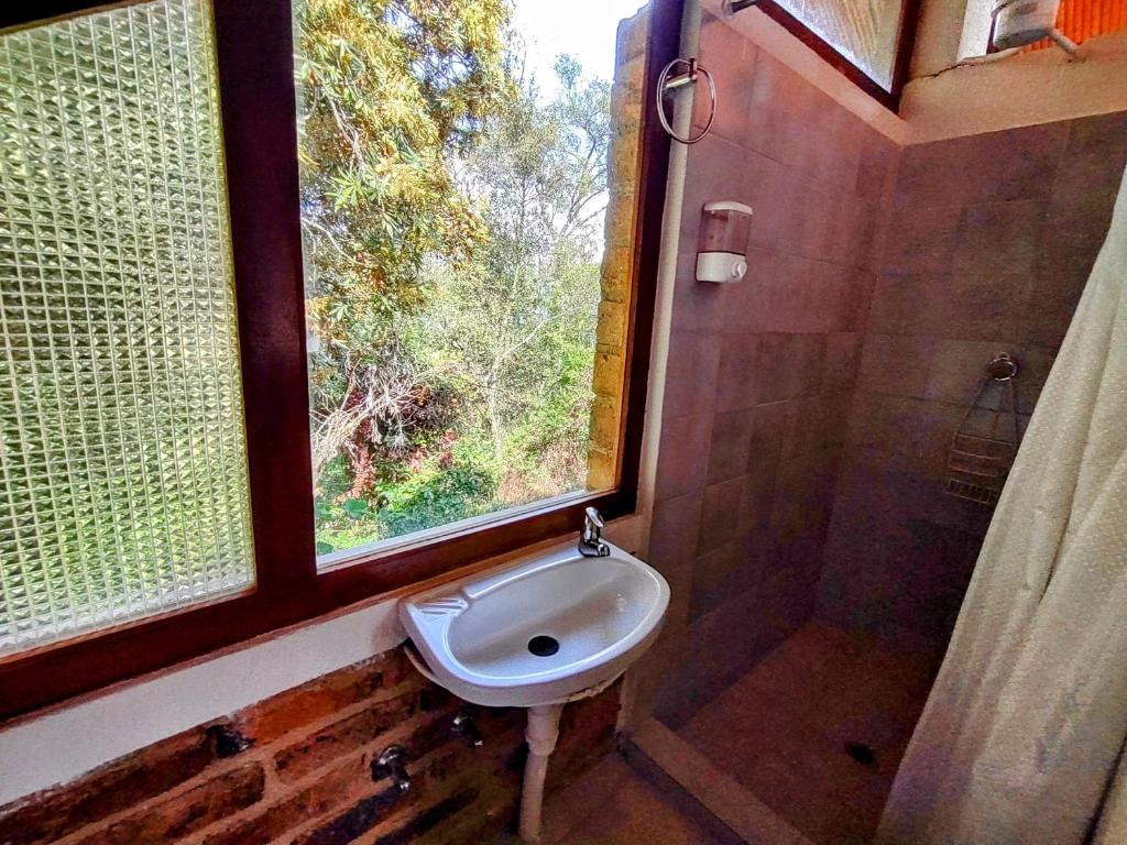 Koupelna v ubytování Refugio Génesis habitaciones Lago de Tota
