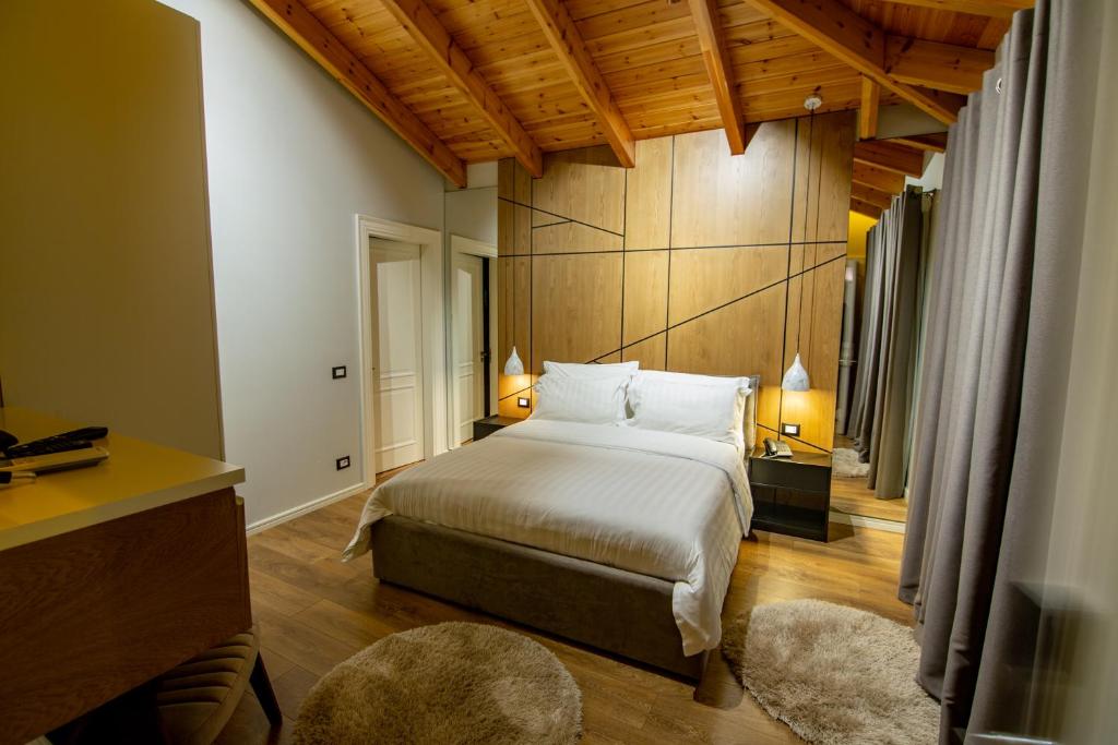 Postel nebo postele na pokoji v ubytování Tree Hotel