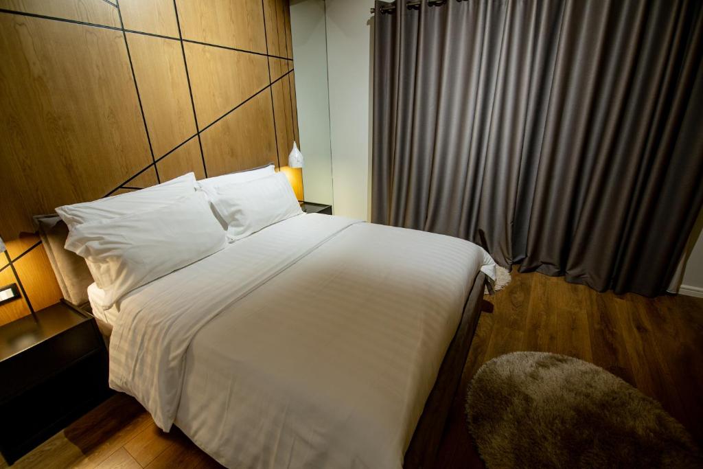Postel nebo postele na pokoji v ubytování Tree Hotel