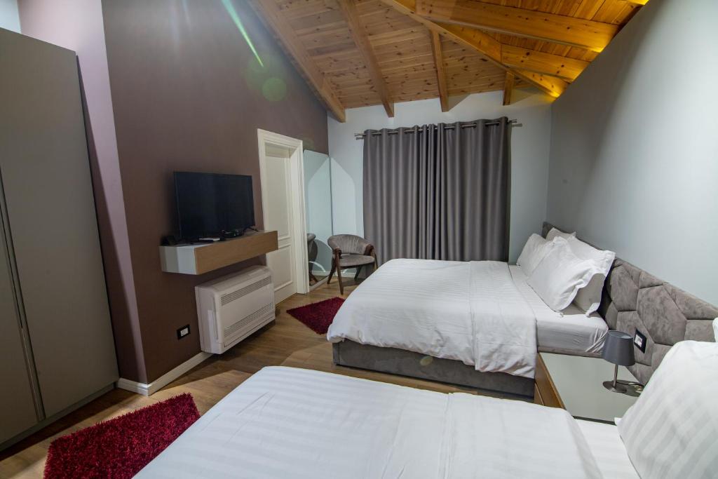 Postel nebo postele na pokoji v ubytování Tree Hotel