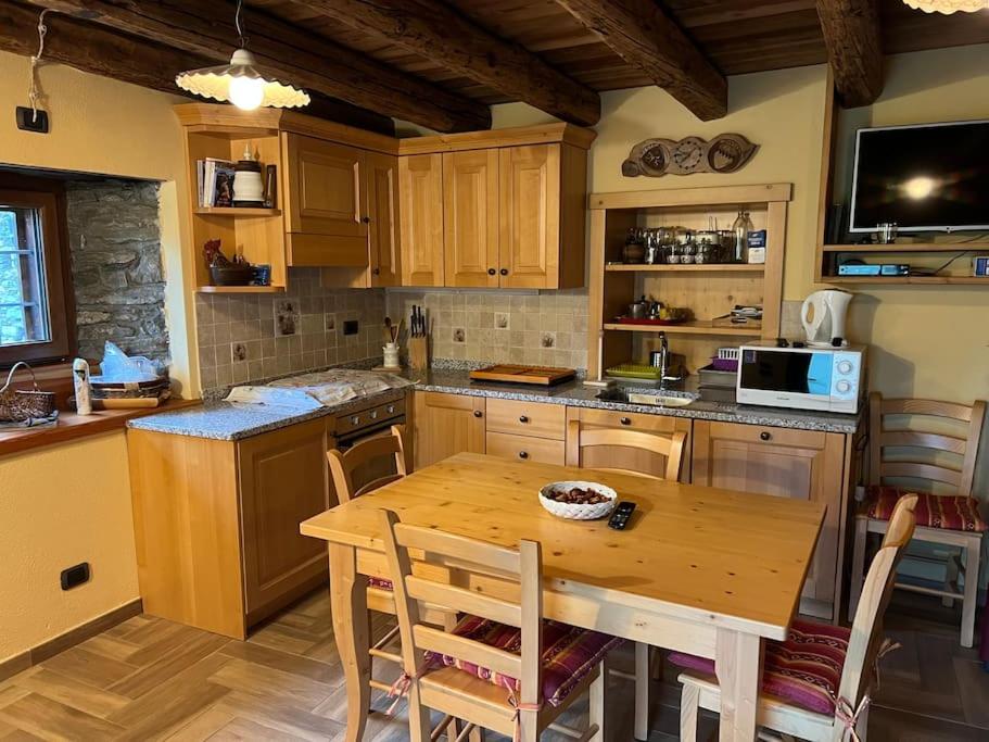 A kitchen or kitchenette at Grandze du Pleiney