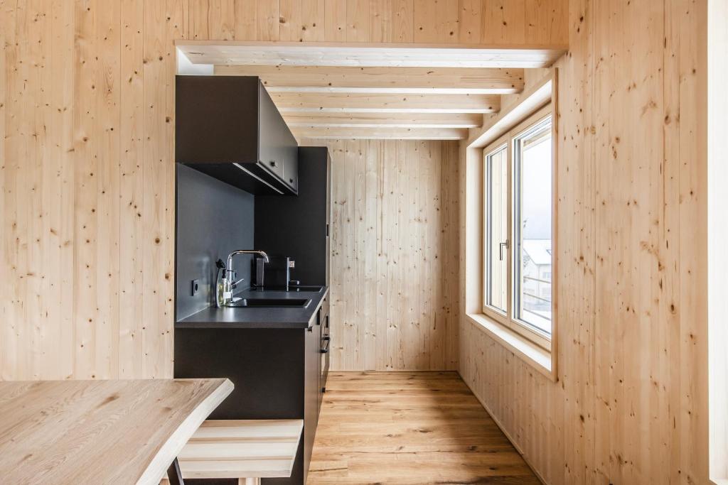 Kuchyň nebo kuchyňský kout v ubytování Haus im WALDner