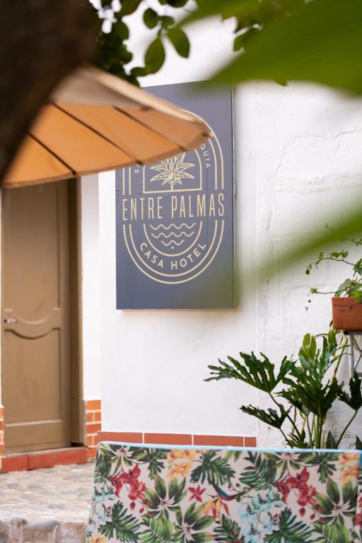 Certifikát, hodnocení, plakát nebo jiný dokument vystavený v ubytování Entre Palmas Casa Hotel