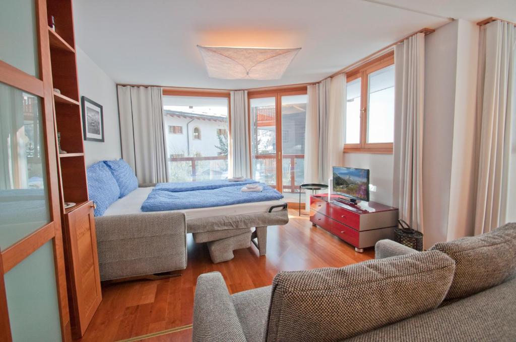 Postel nebo postele na pokoji v ubytování Casa D'Amore, Apartment Lyskamm