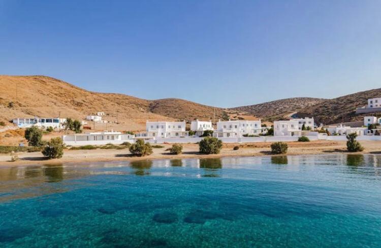 a group of white houses on the shore of a river at Nefeli Residence @ Astypalaia island in Analipsi
