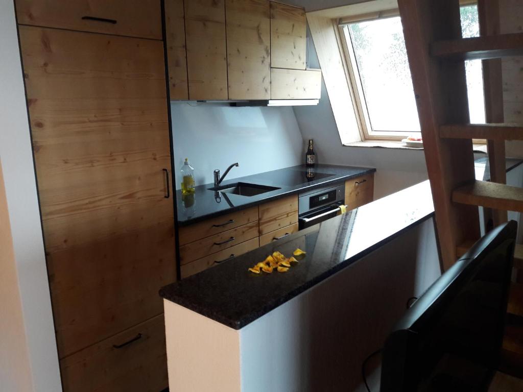 Kuchyň nebo kuchyňský kout v ubytování Haus Gimpel Flumserberg