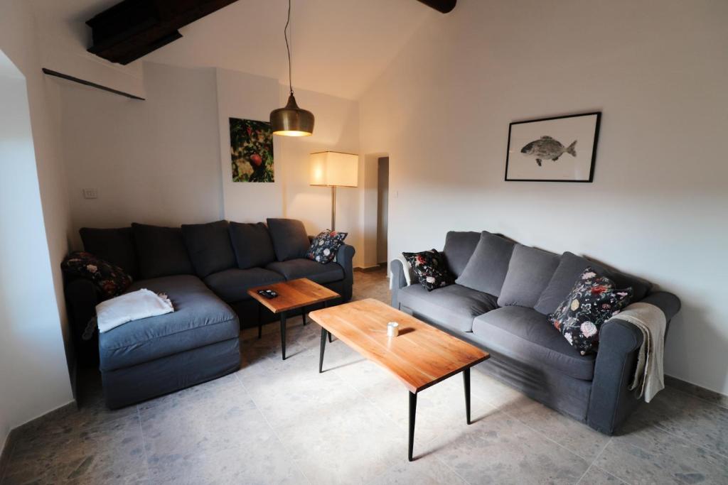 Posedenie v ubytovaní Appartements à la ferme