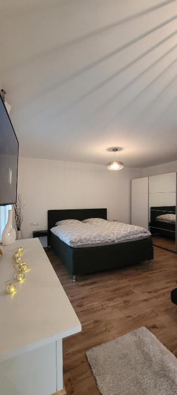 Postel nebo postele na pokoji v ubytování Apartment am Weinberg Kleinaspach