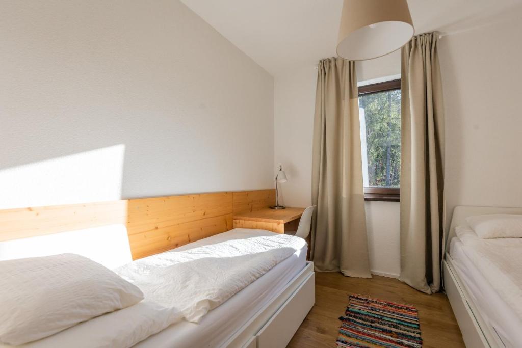 Postel nebo postele na pokoji v ubytování Lúčnica apartments Tále