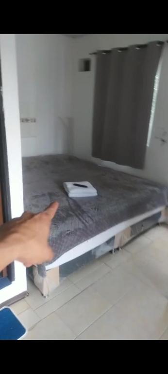 Postel nebo postele na pokoji v ubytování International House Co-Living