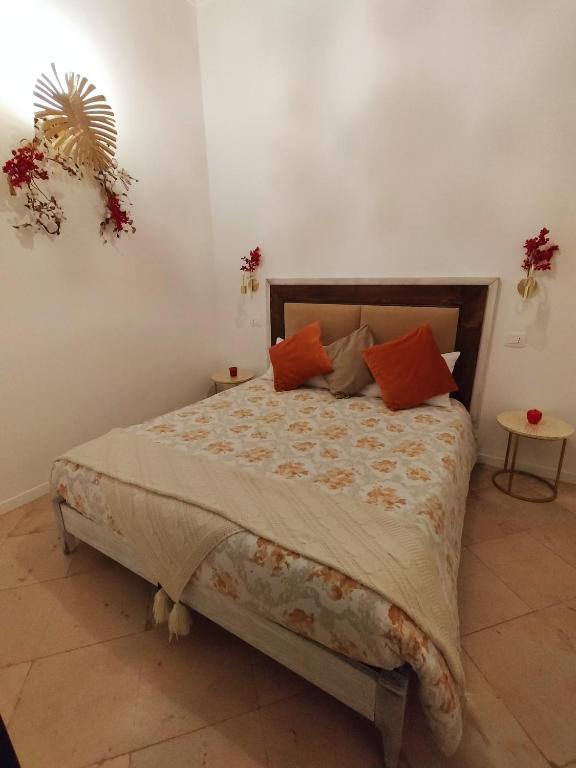 Posteľ alebo postele v izbe v ubytovaní TRESCA CHARME luxury Rooms