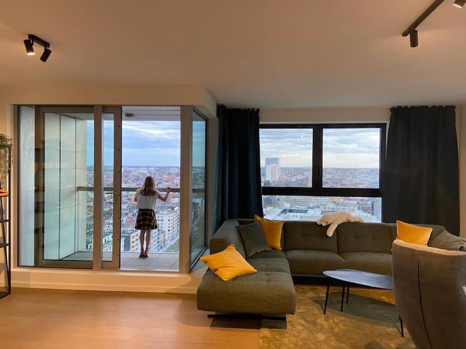 Area soggiorno di UNIEK appartement - mooiste en hoogste uitzicht op Antwerpen! - incl gratis parking
