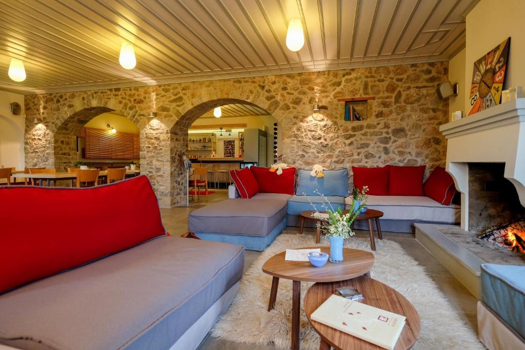 Posezení v ubytování Kyriaki Guesthouse & Suites
