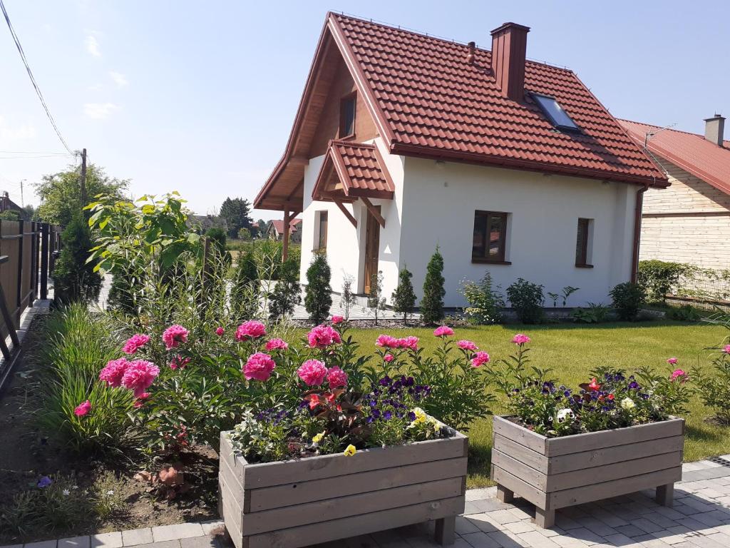 Zahrada ubytování Przystanek Tykocin - domki gościnne w sercu Podlasia