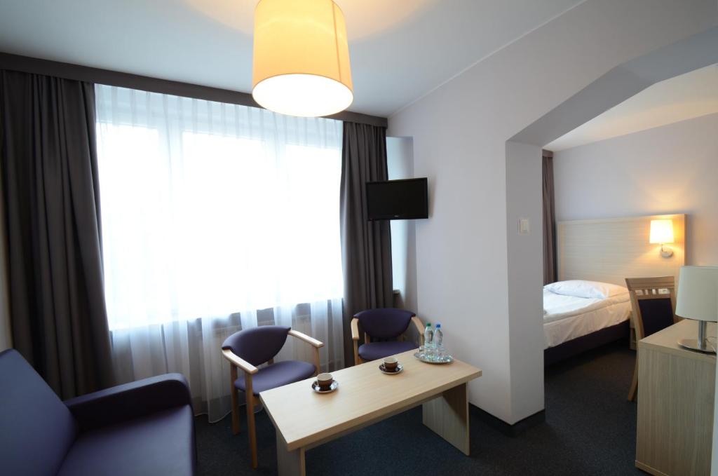 Posteľ alebo postele v izbe v ubytovaní Hotel PZMot