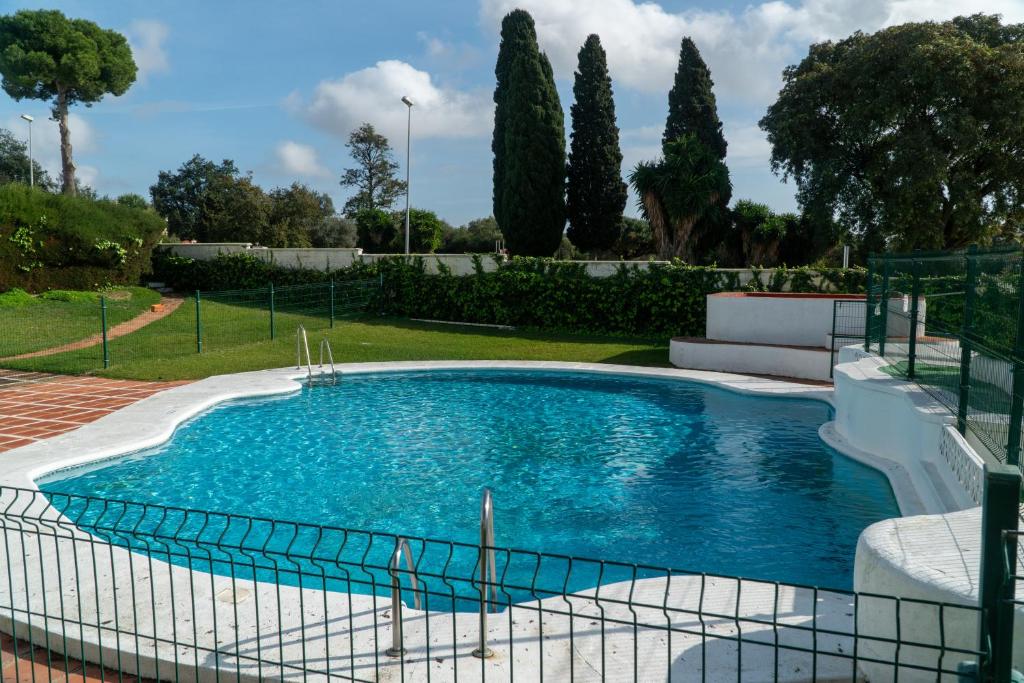 Bazén v ubytování Vistahermosa Palm nebo v jeho okolí