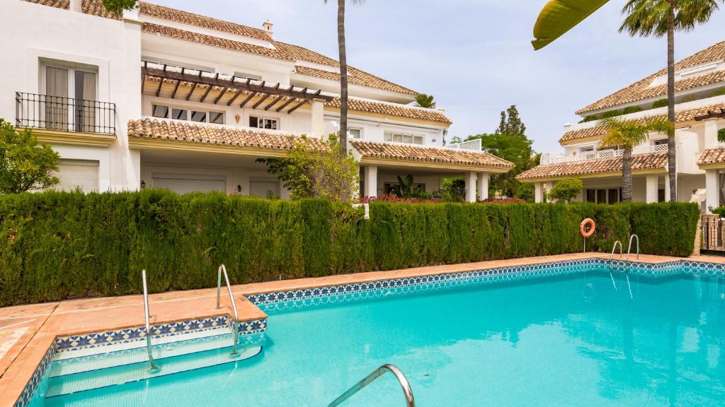 Bazén v ubytovaní Luxury apartment at Monte Paraiso alebo v jeho blízkosti