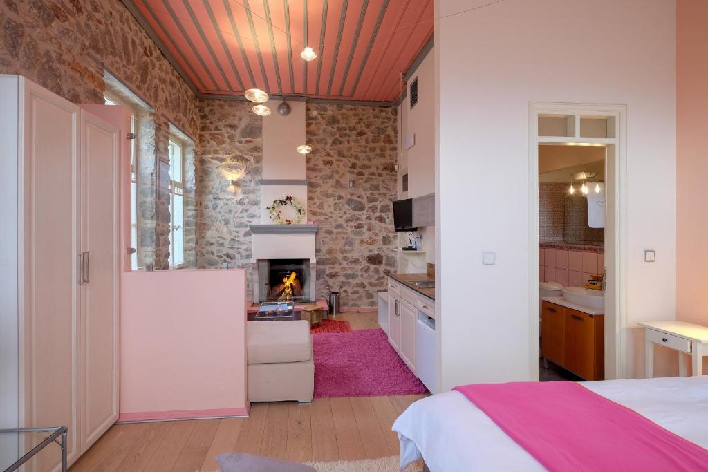 Kuchyň nebo kuchyňský kout v ubytování Kyriaki Guesthouse & Suites
