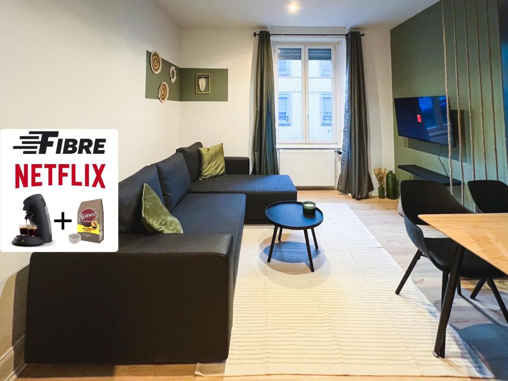 A seating area at Appart'Hôtel Le Valdoie - Rénové, Calme & Netflix
