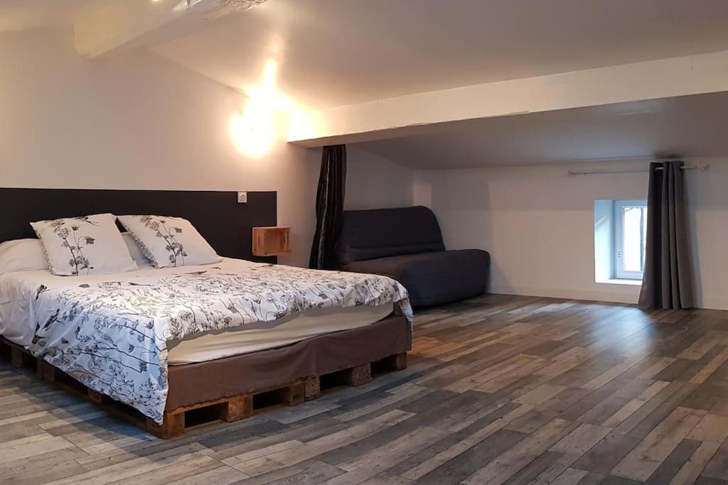 Posteľ alebo postele v izbe v ubytovaní Gîte avec Piscine Proche de Carcassonne