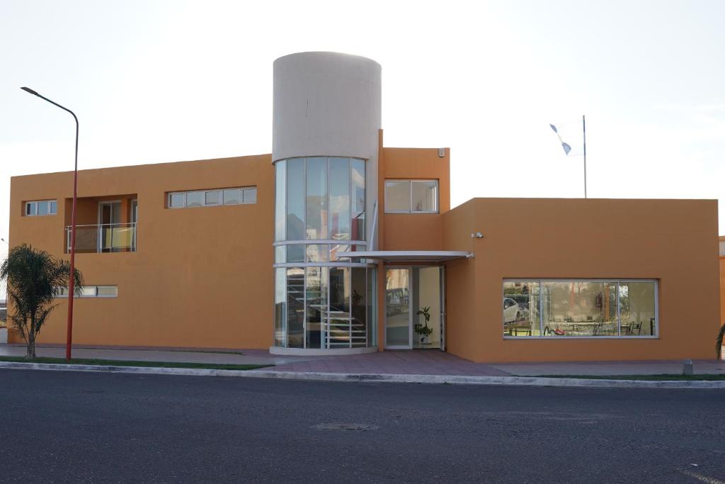 a building on the side of a street at La Posada de Salim in La Punta