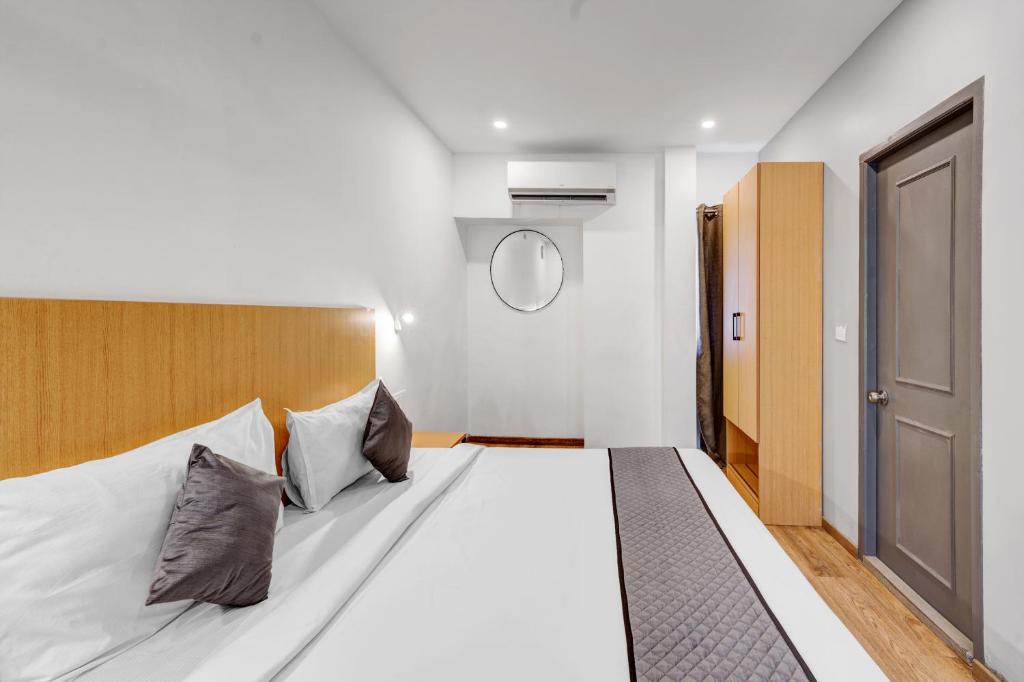 Postel nebo postele na pokoji v ubytování UPAR Hotels Uthandi, ECR