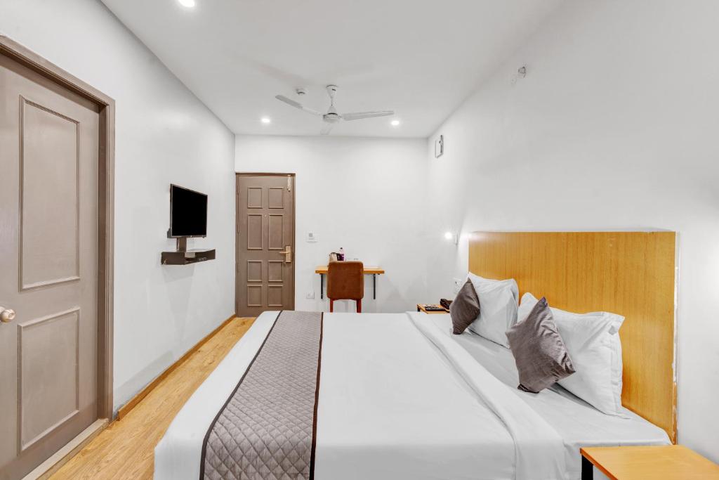 Postel nebo postele na pokoji v ubytování UPAR Hotels Uthandi, ECR