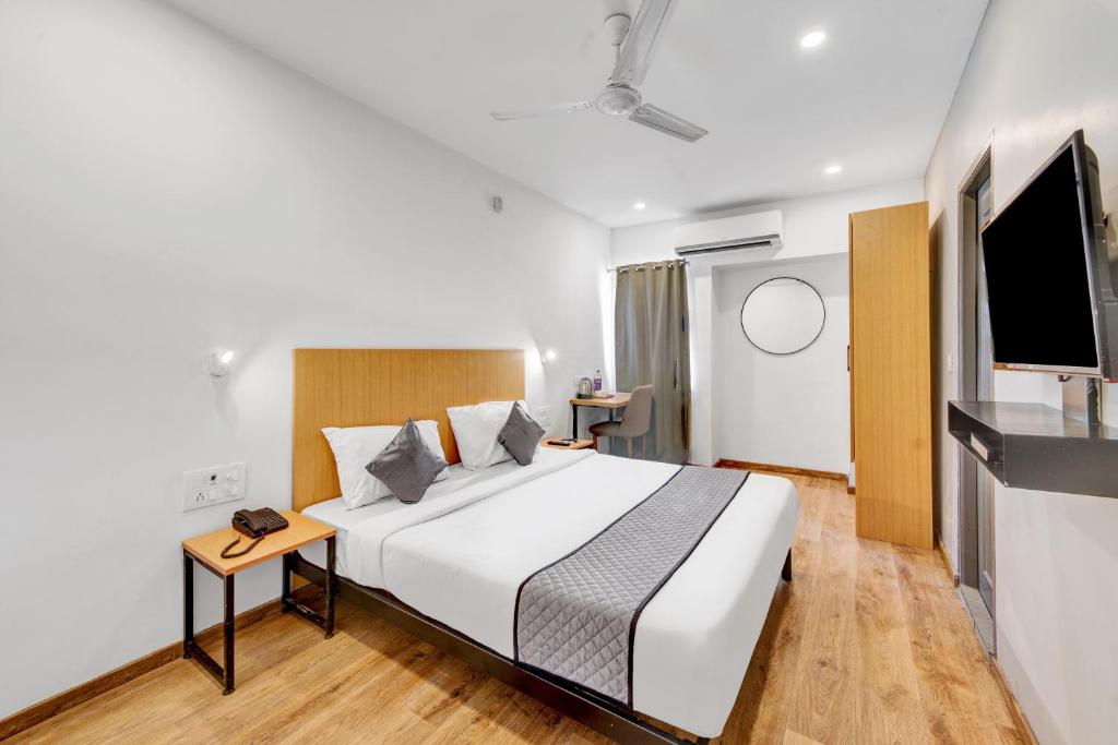 Postel nebo postele na pokoji v ubytování UPAR Hotels Uthandi, ECR