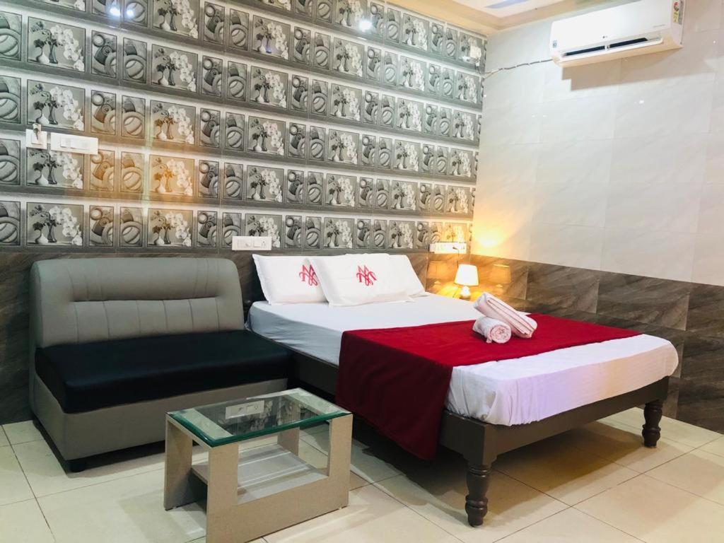 Postel nebo postele na pokoji v ubytování MARINA PALACE