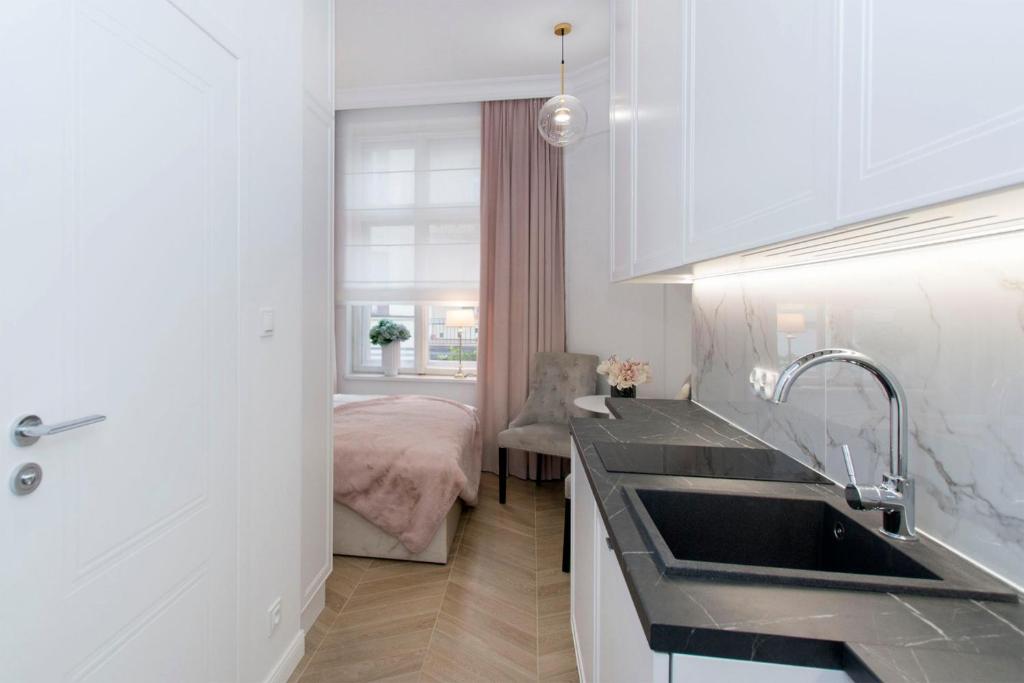 Kuchyňa alebo kuchynka v ubytovaní La Boutique Studio Sopot