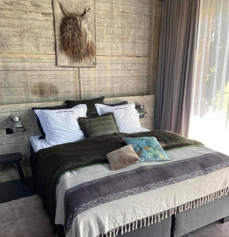 Postel nebo postele na pokoji v ubytování Le Loft ATELIER