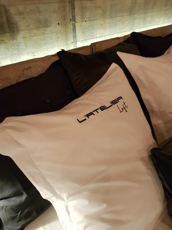 Postel nebo postele na pokoji v ubytování Le Loft ATELIER
