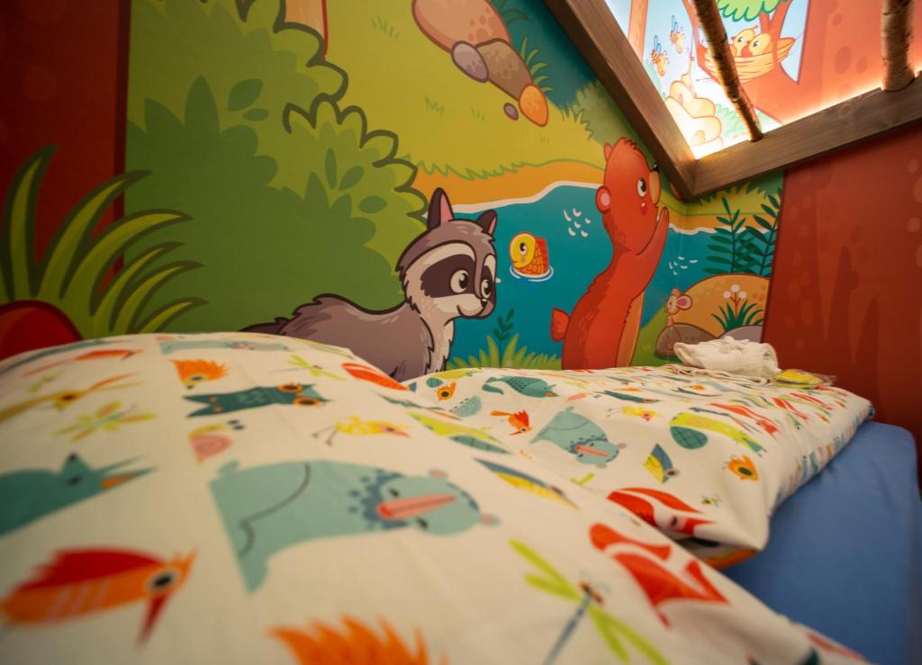 Postel nebo postele na pokoji v ubytování Hotel Touring