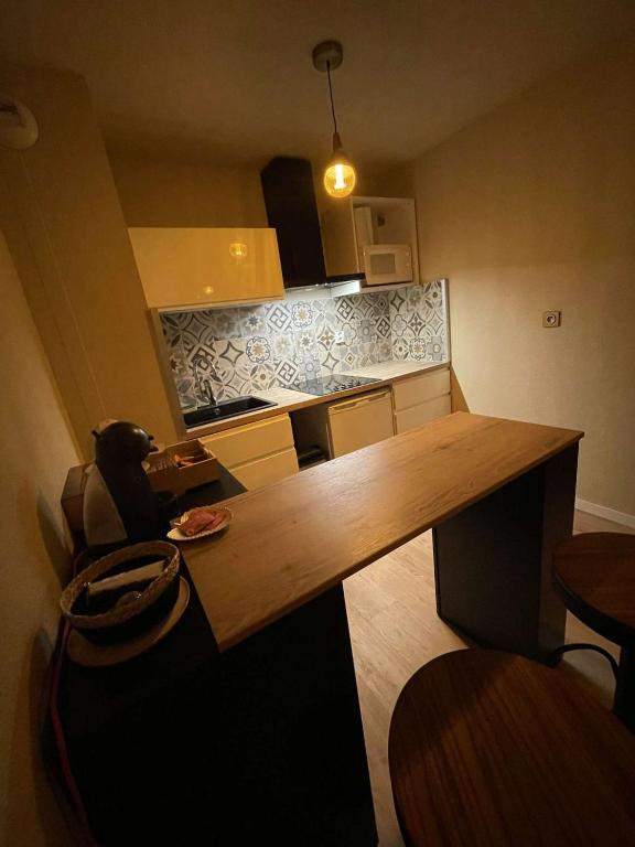 Kuchyňa alebo kuchynka v ubytovaní Sublime appartement avec balneo