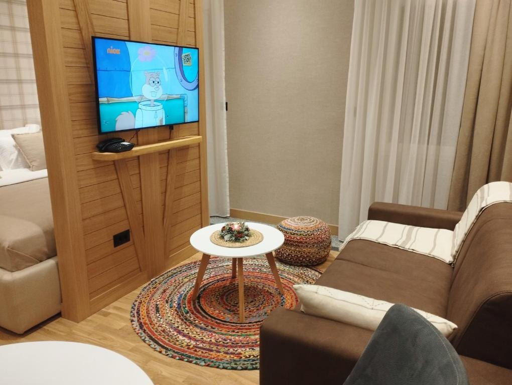 TV a/nebo společenská místnost v ubytování WILD BEAUTY Apartment-Modern mountain 2