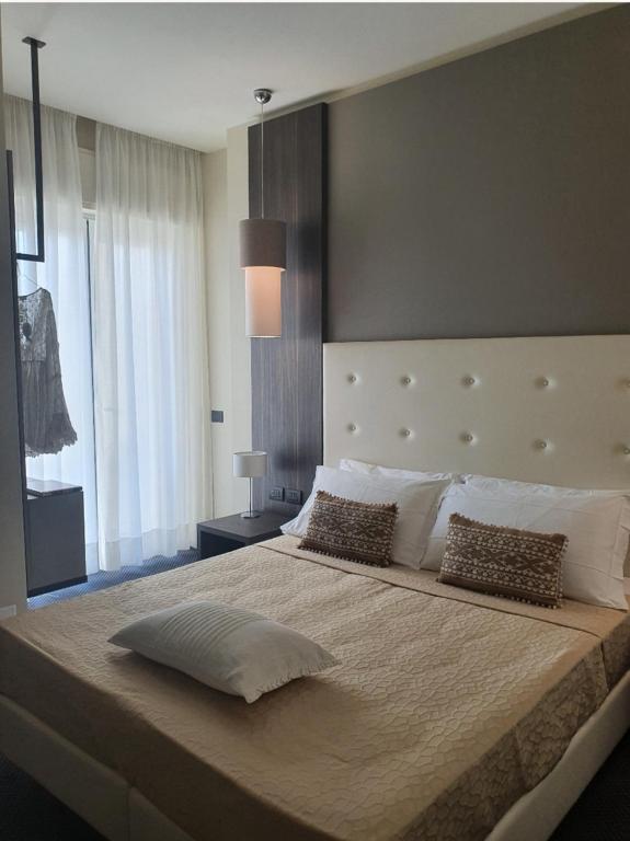 Postel nebo postele na pokoji v ubytování Hotel Esplanade