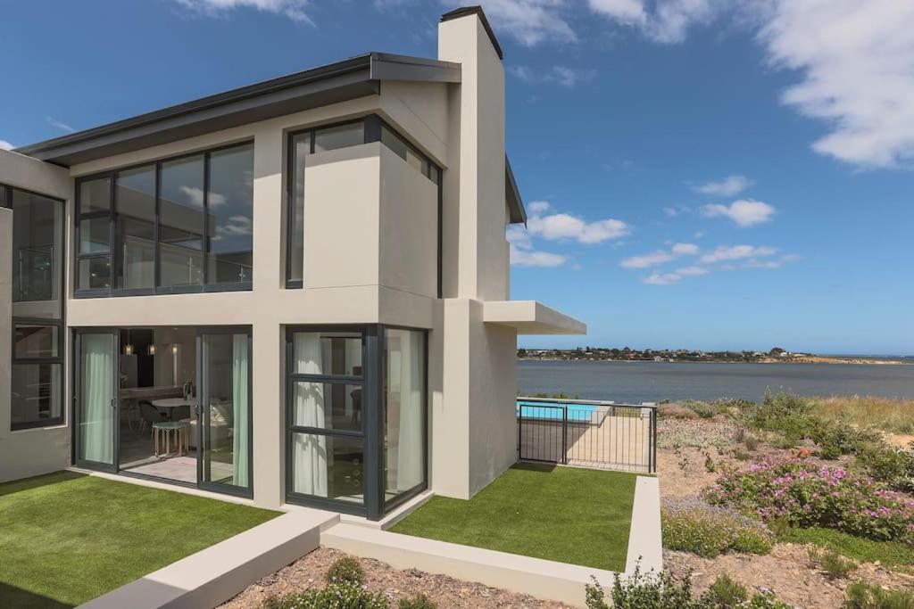 a rendering of a house with a view of the ocean at Water, views, vineyards, The Zen in Hermanus