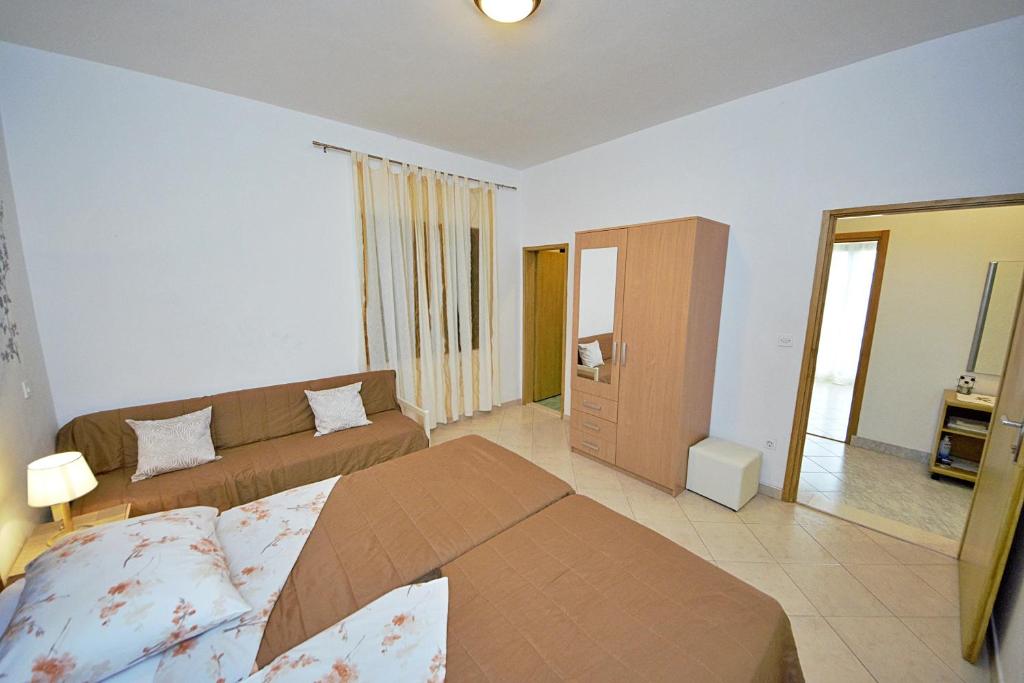 Postel nebo postele na pokoji v ubytování Villa Vesna