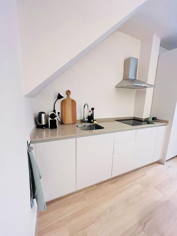 Kuchyňa alebo kuchynka v ubytovaní Brandnew beachfront appartment