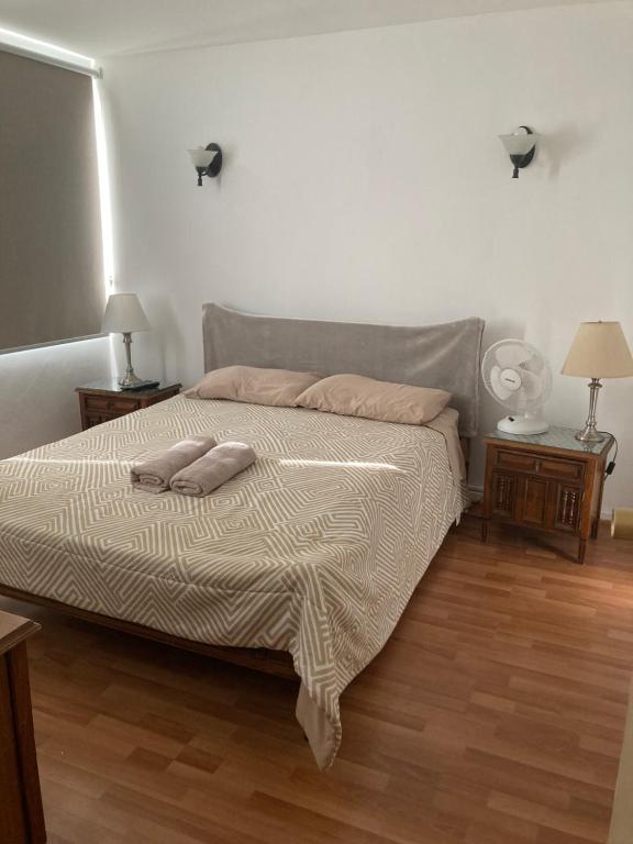 Ένα ή περισσότερα κρεβάτια σε δωμάτιο στο Casa 15 Norte